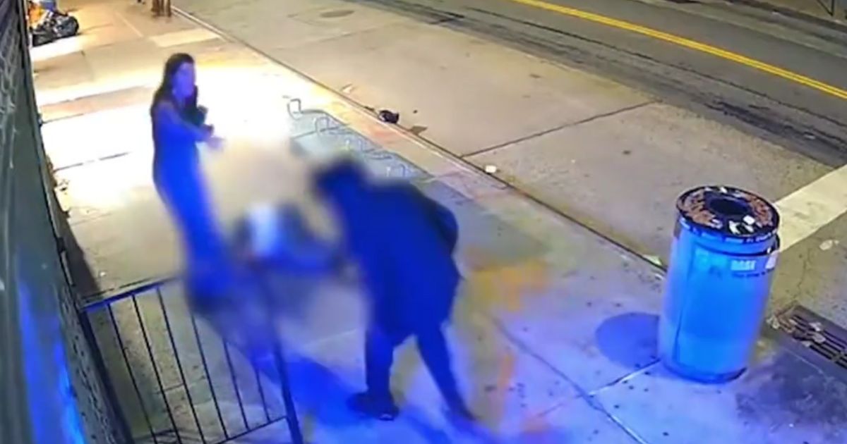 The assailant came back to spit on the stabbing victim's horrified girlfriend before kicking the fallen man.